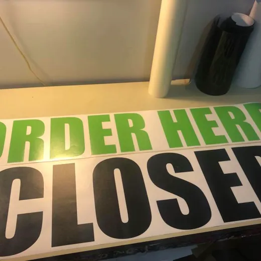 Cut vinyl signage lettering, weeded and ready to apply, by Signs613