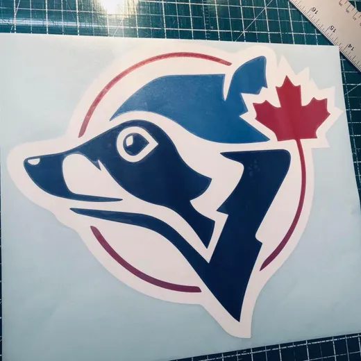 Layered vinyl logo decal cut and assembled by Signs613